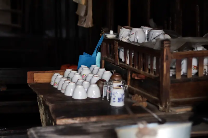 The wooden interior of a century-old tea shop in an old town in Baoshan