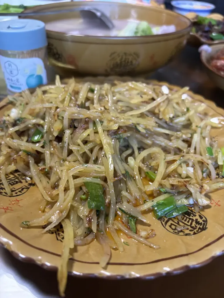 Fresh vegetables prepared for a home-cooked meal in a Yiwu tea village