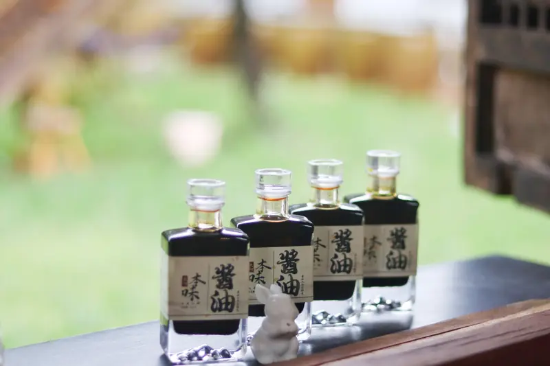 Bottles of handmade soy sauce from a traditional Yunnan workshop