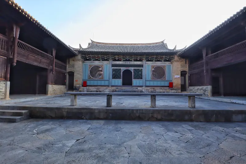 Stone courtyard of an ancestral hall in Shiping's 600-year-old village.