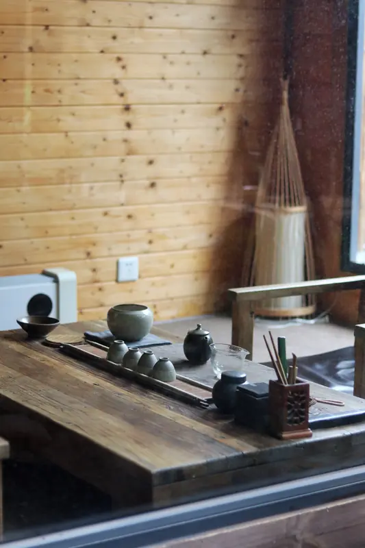 Vegan fine dining restaurant interior with wood tea counter, Yunnan