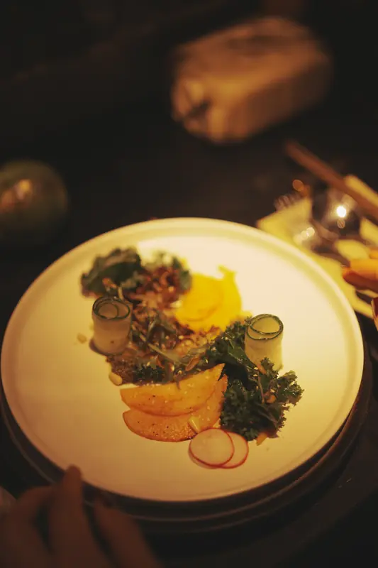 Plated vegetable course with kale and radish, Yunnan fine dining