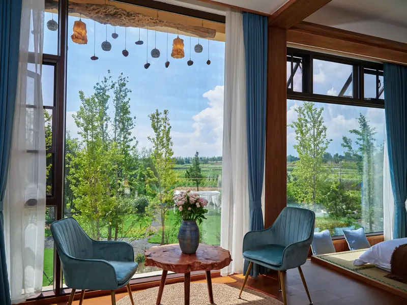 Homestay window seating area overlooking the countryside, Yunnan