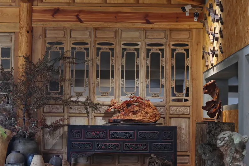 Interior of a traditional wood carving workshop in Yunnan